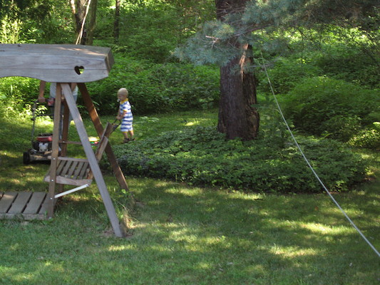Tim and Ben mowing the lawn (07-24-2005 10:40)